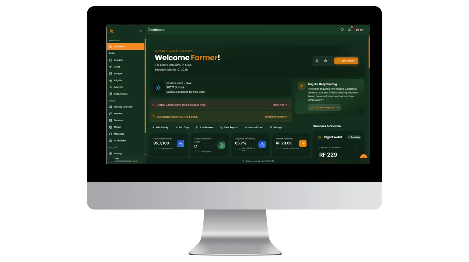 Faminga farmer dashboard open on a desktop monitor